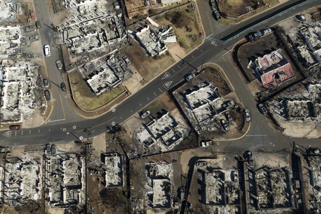 Aerial view of the devastating damage from the Maui wildfires, underscoring the critical need for the Maui Relief Fund organized by Hawai‘i Foodbank to support affected communities.